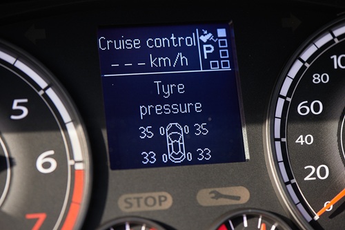 Car dashboard showing tyre pressure data